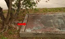 Open space in metal drain cover.