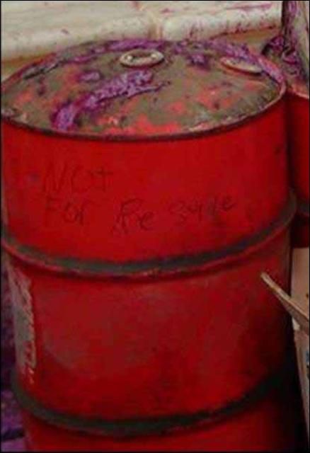 Figure 1. Pesticide drum bulging from extreme heat.